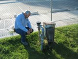 Man inspecting a backflow system