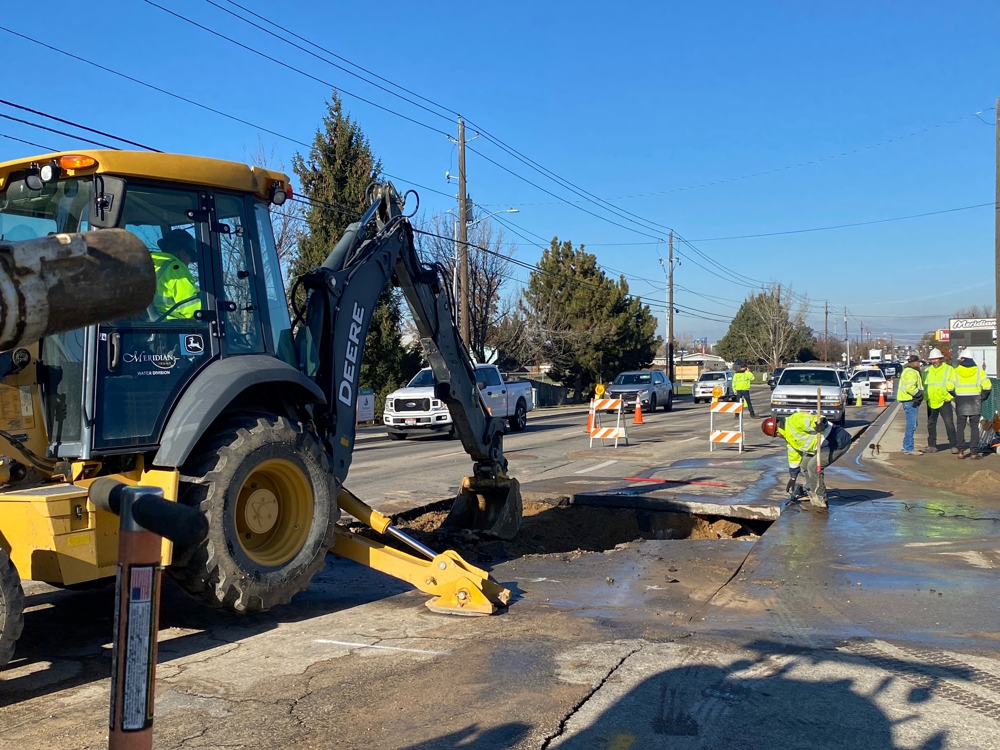 Crews working on the water main break on Meridian Road south of Franklin