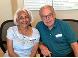 Two volunteers at the Meridian City Hall Volunteer Front Desk