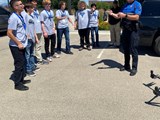 Police Officer demonstrating a drone to the Youth Safety Academy.