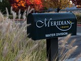 Mailbox with the Meridian City logo with the text Water Division under it