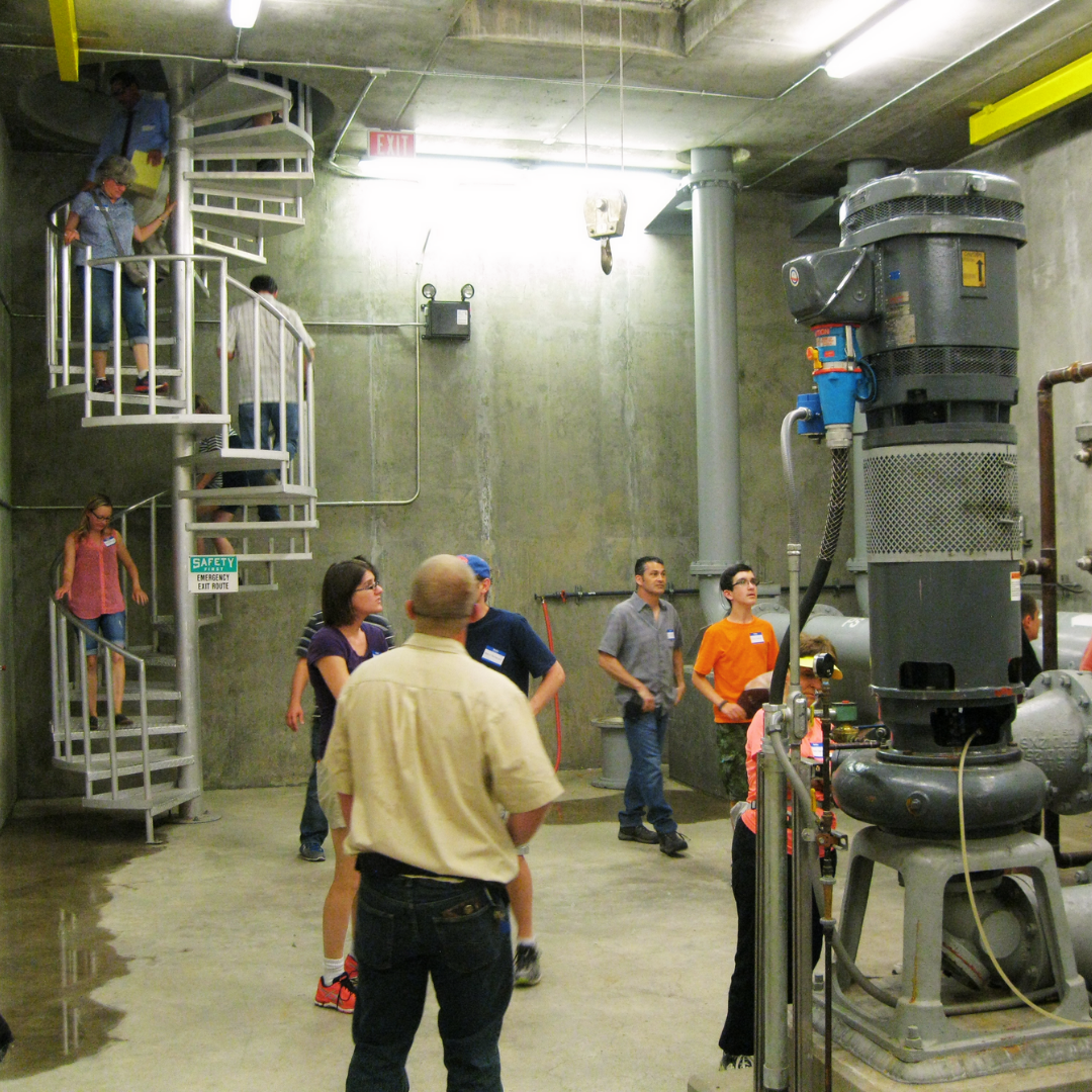 People inside a City of Meridian Lift Station on the Go with the Flow Facilities Tour